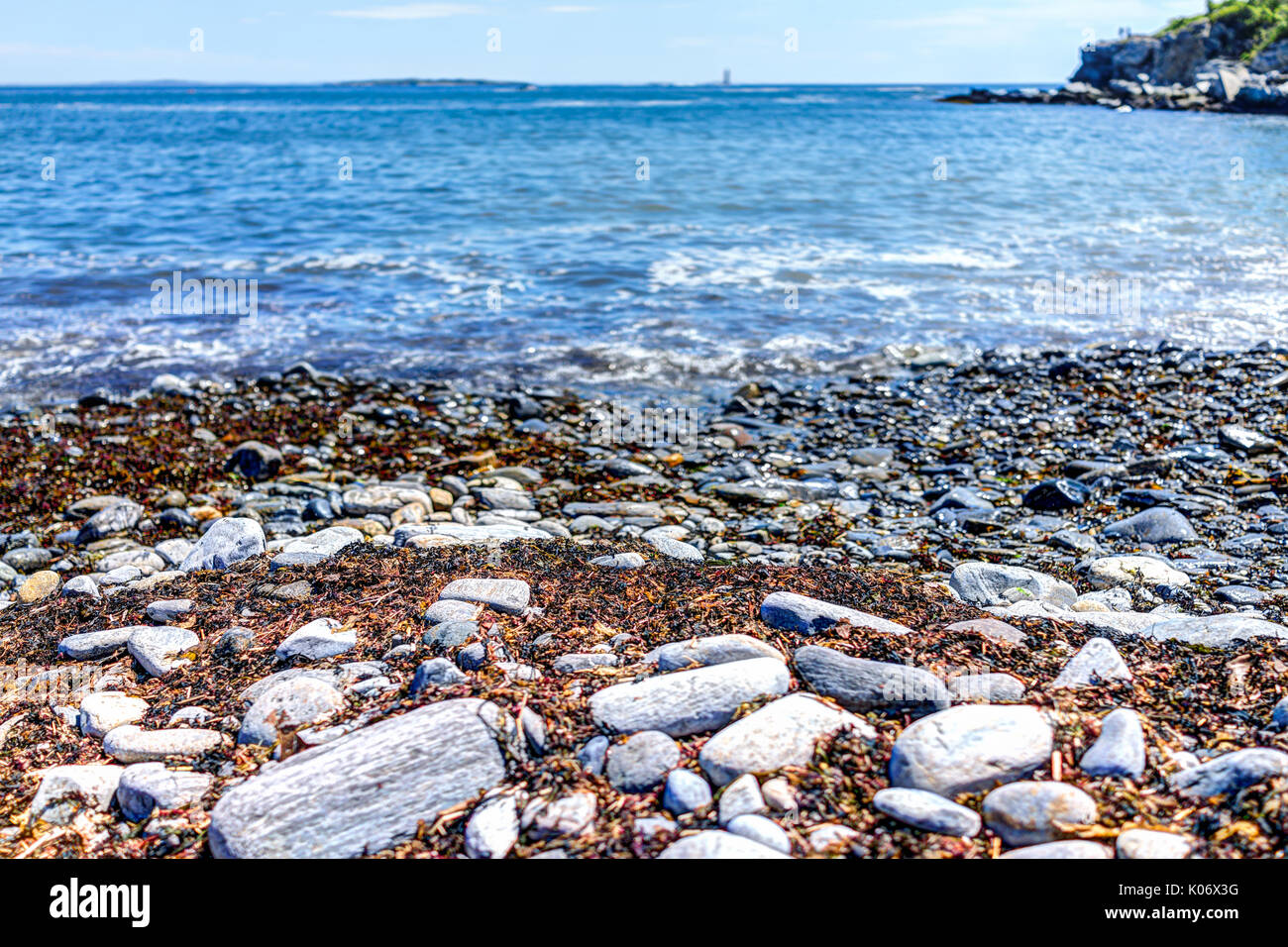 Rocky public beach called Ship Cove by Portland Head Lighthouse in Cape
