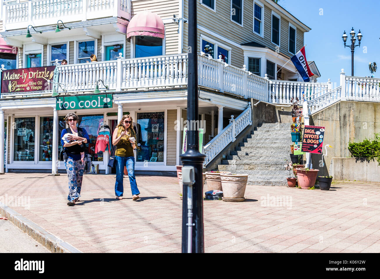 Kennebunkport, USA June 10, 2017 People walking on sidewalk street
