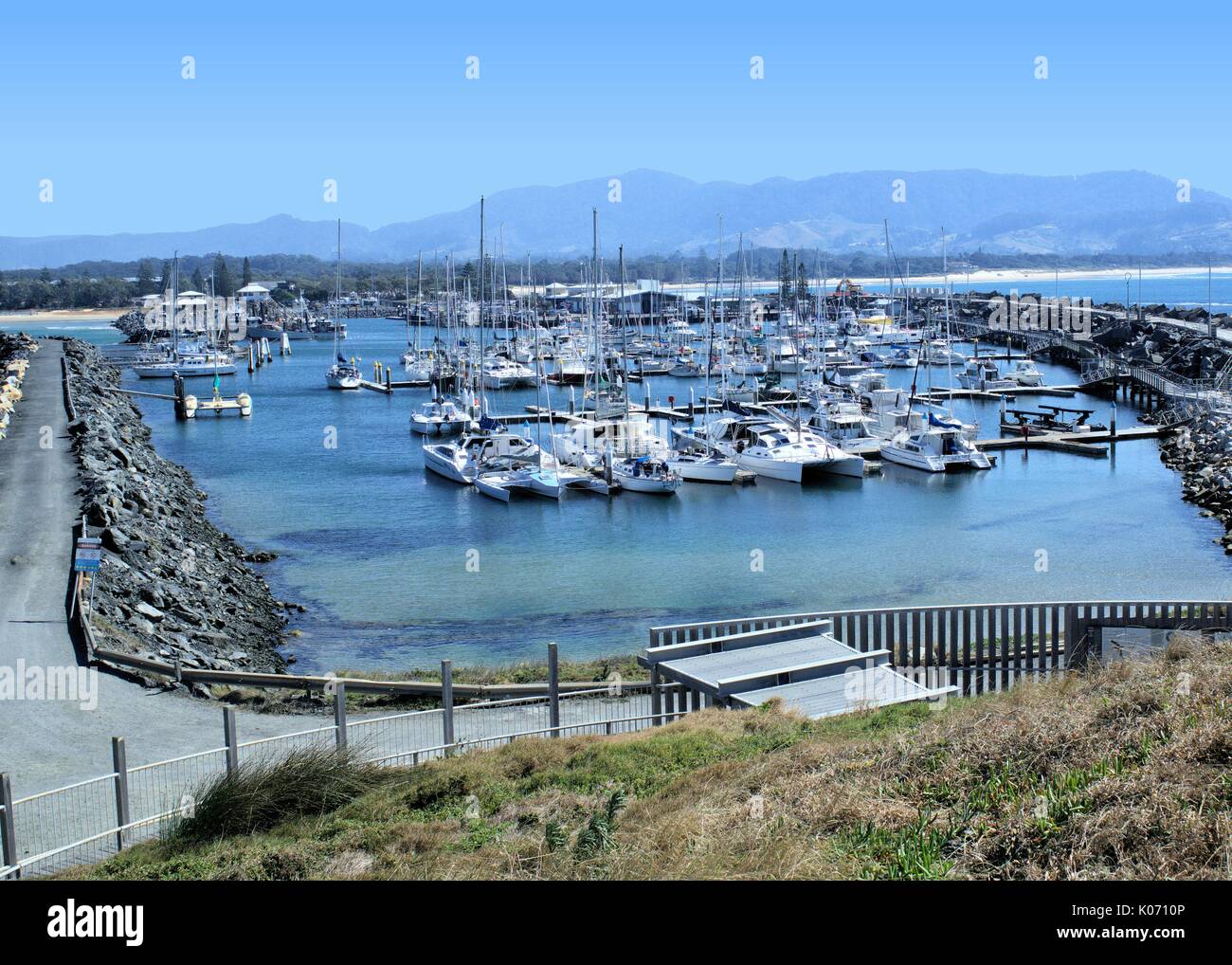 Panoramic view of Jetty beach, Coffs Harbour International Marina, blue ocean water and blue sky in Coffs Harbour Australia Stock Photo