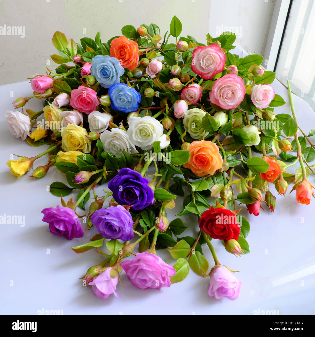 Colorful roses flower background, group of multicolor rose make from clay,  handmade product from clever of hand, ornament from clay art so amazing  Stock Photo - Alamy