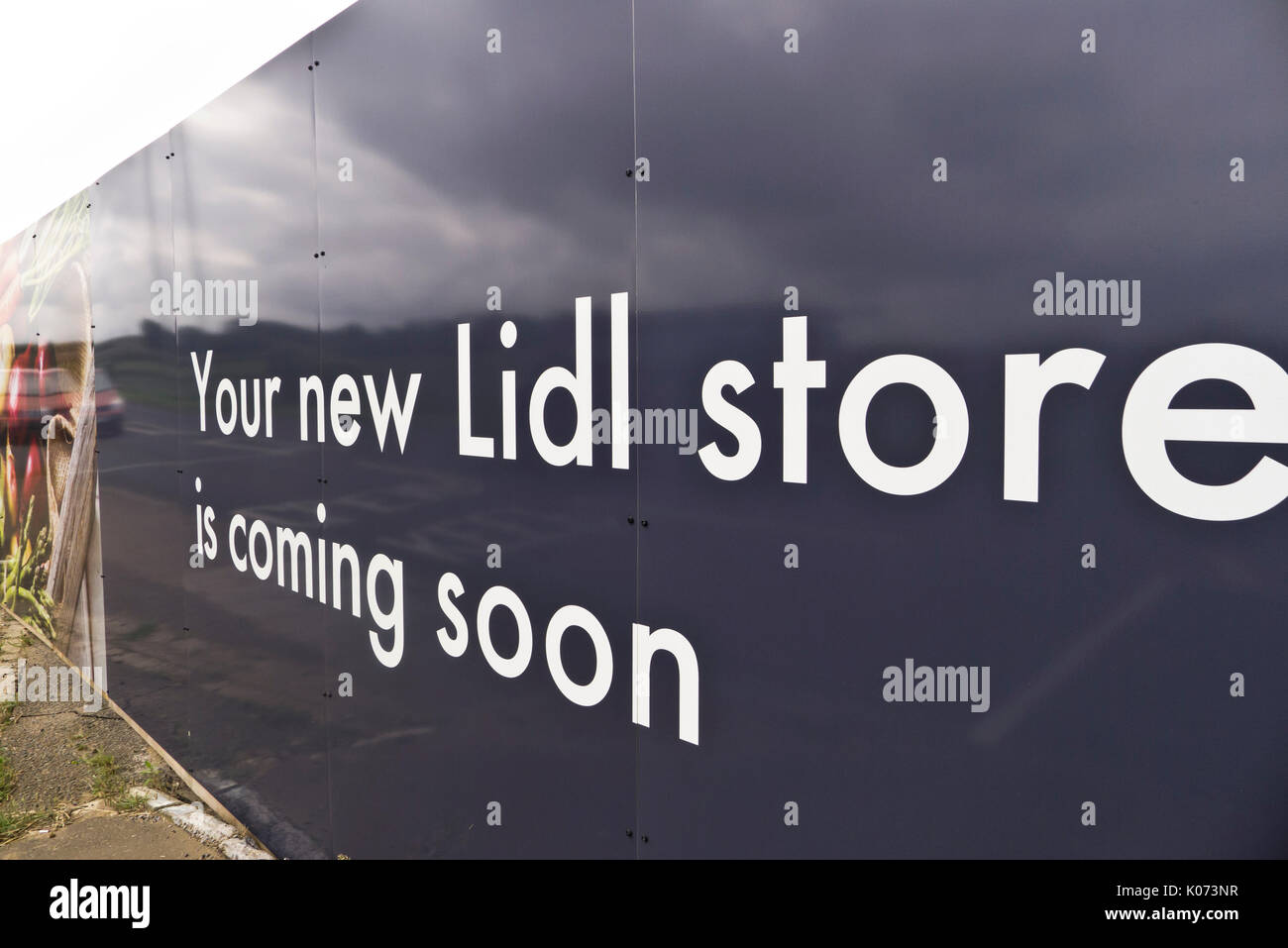 Hoardings around the site of a new Lidl supermarket being developed at Heacham in Norfolk. Stock Photo