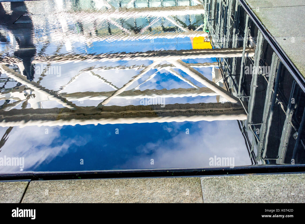 Water reflections of art and architecture at the Centre Pompidou Stock Photo