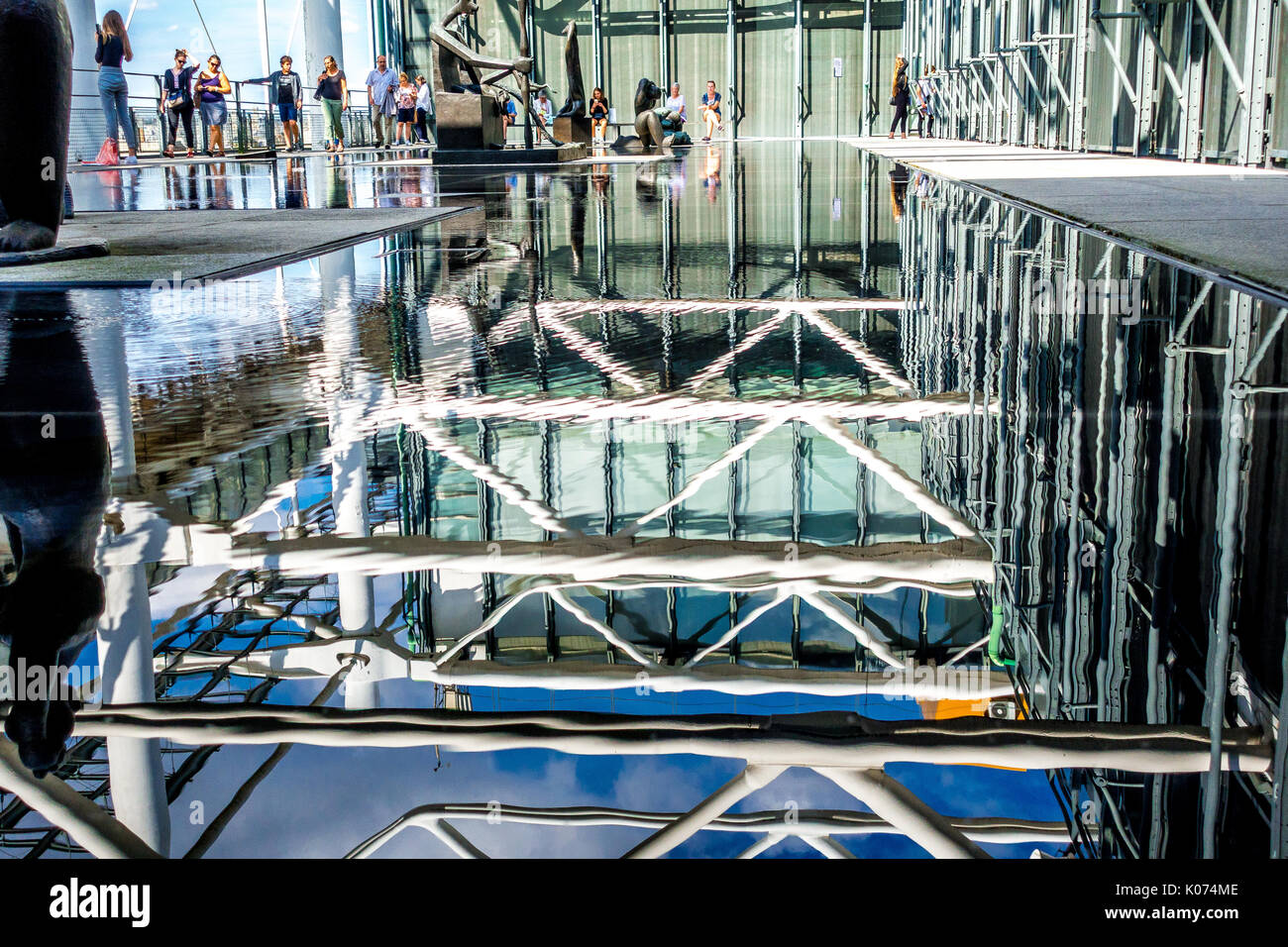 Water reflections of art and architecture at the Centre Pompidou Stock Photo
