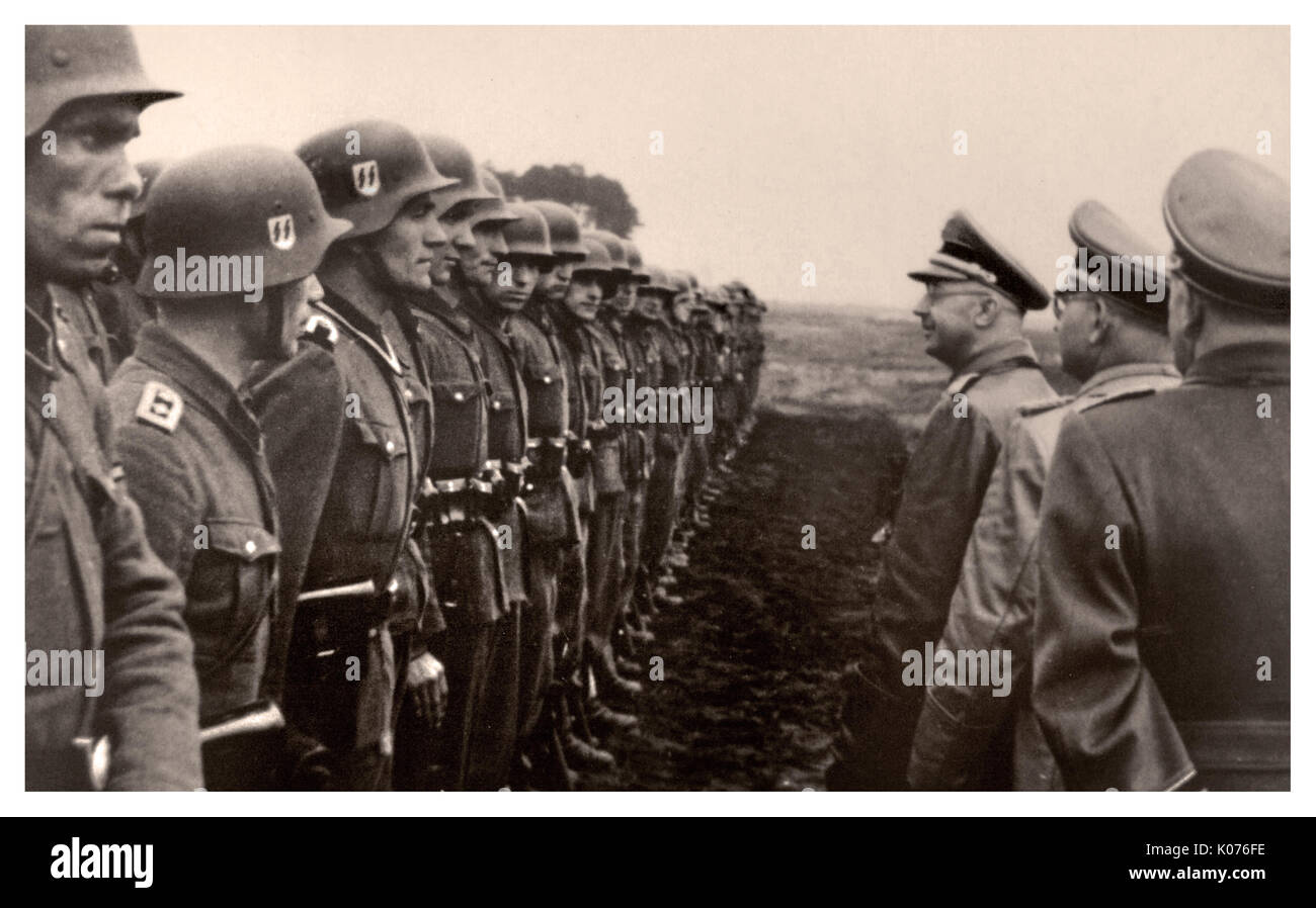PROPAGANDA IMAGE HIMMLER WAFFEN SS TROOPS REVIEW Waffen SS Troops reviewed by Himmler and Gruppenfūhrer Dr Wachter In Germany On June 3rd 1944 World War 2 Stock Photo