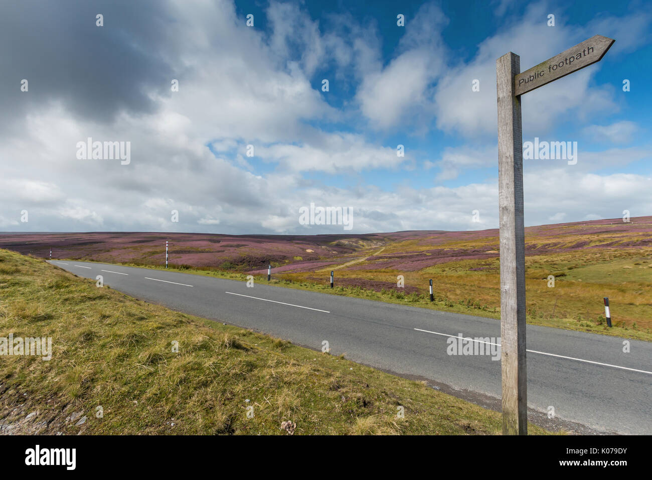 North Pennines landscape, heather moors and public footpath signpost at Little Eggleshope, Teesdale, UK August 2017 with copy space Stock Photo