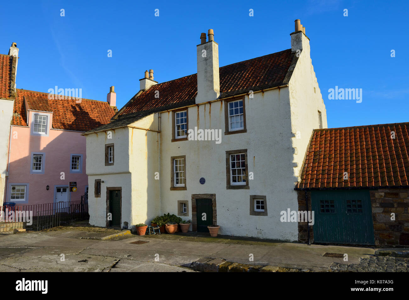 Renovated buildings on waterfront of Scottish coastal town of