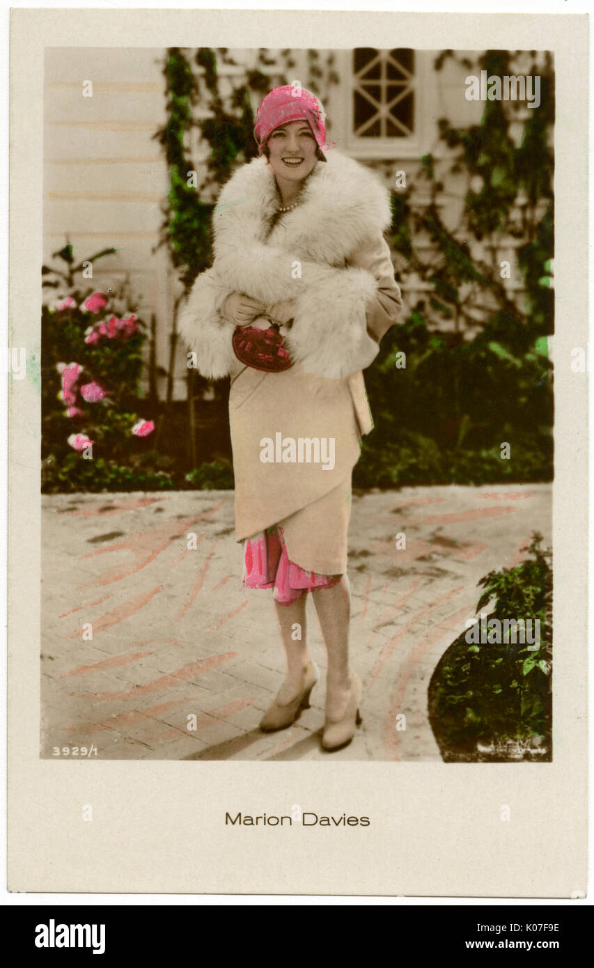 Marion Davies (1897 - 1961),  American film actress standing in the driveway,  ready to go out      Date: 1898 - 1961 Stock Photo