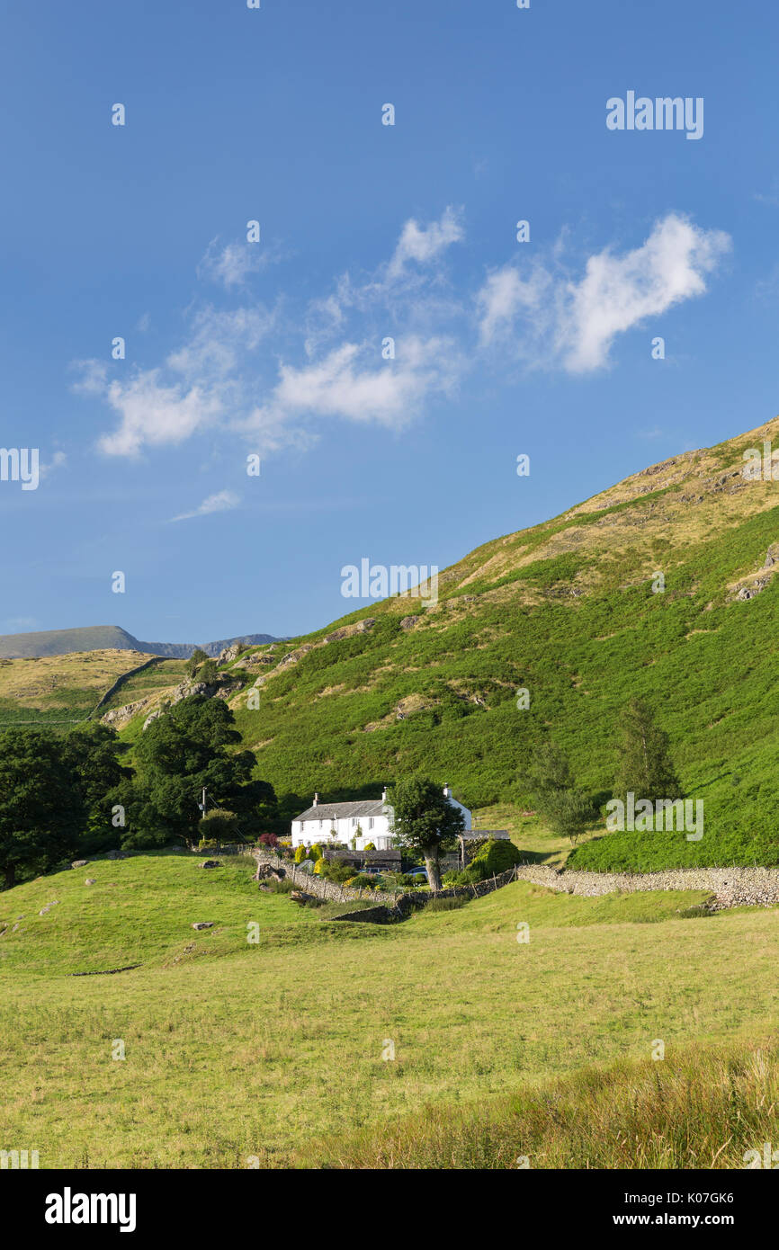 Stone Cottage and Piper House, nestled below High Rigg, south-east of ...