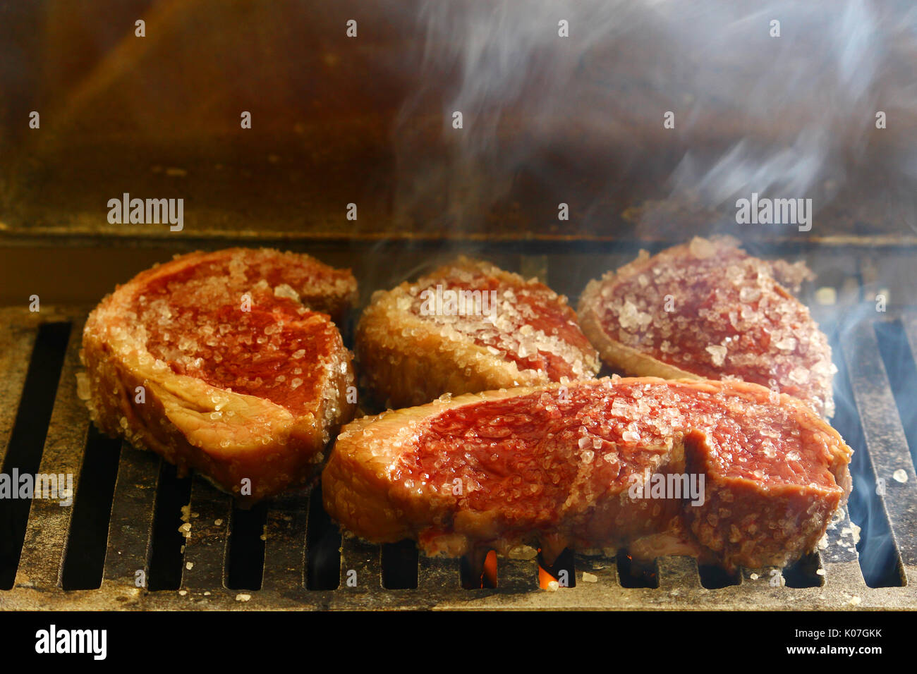 Brazilian barbecue meat picanha on charcoal grill Stock Photo Alamy