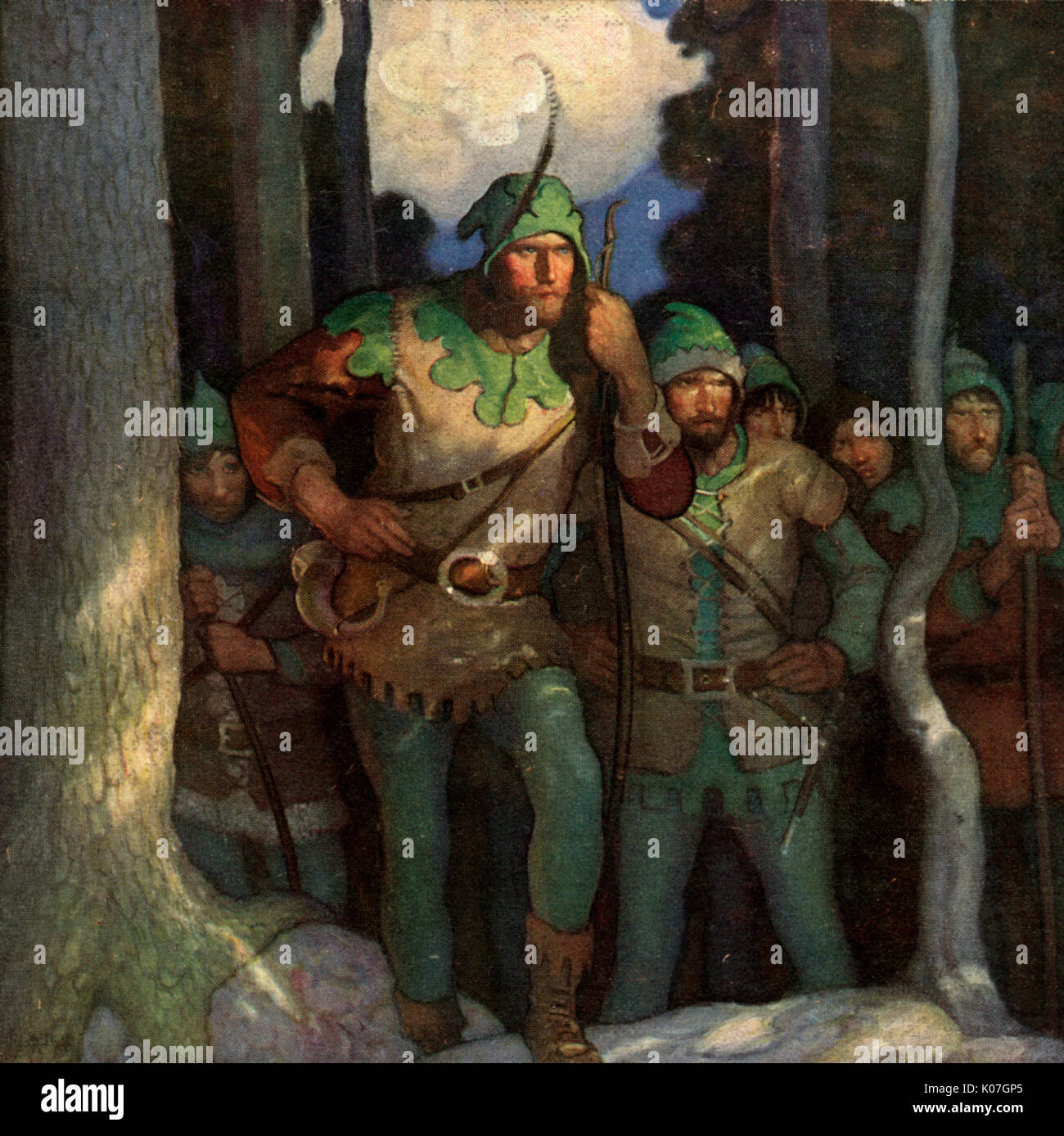 Robin and his Merry Men emerge  cautiously from the forest.         Date: 1921 Stock Photo