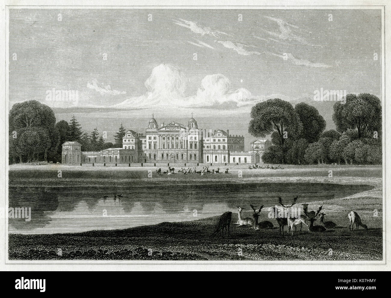 Badminton, Gloucestershire,  viewed across the lake : the  estate is famous for its horse  trials and other sporting  associations.      Date: 1820s Stock Photo