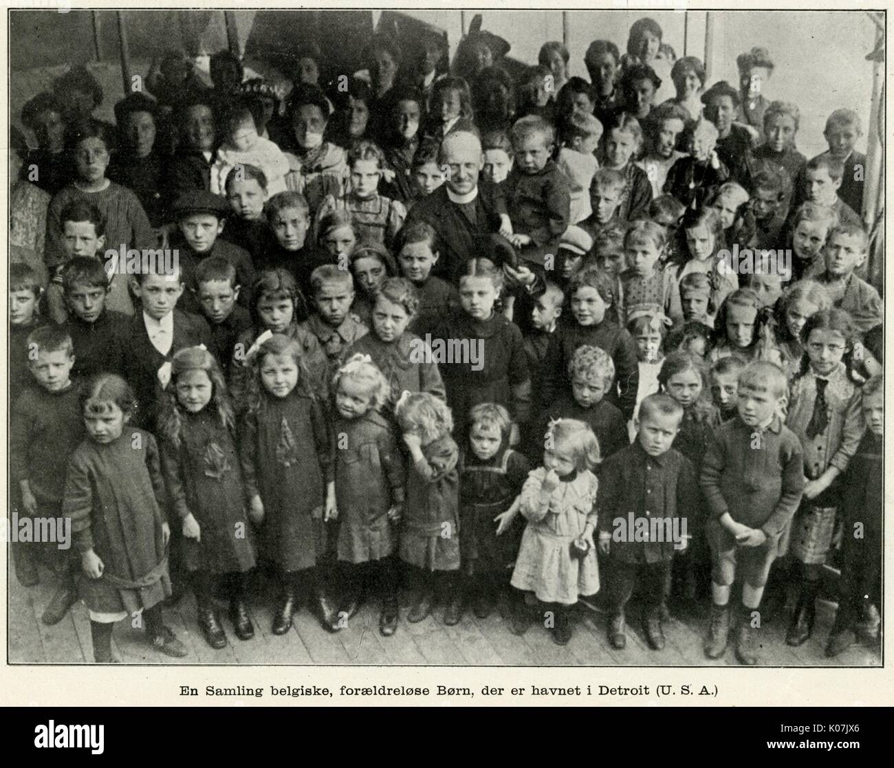 Belgian war orphans with Father Syoens WWI Stock Photo