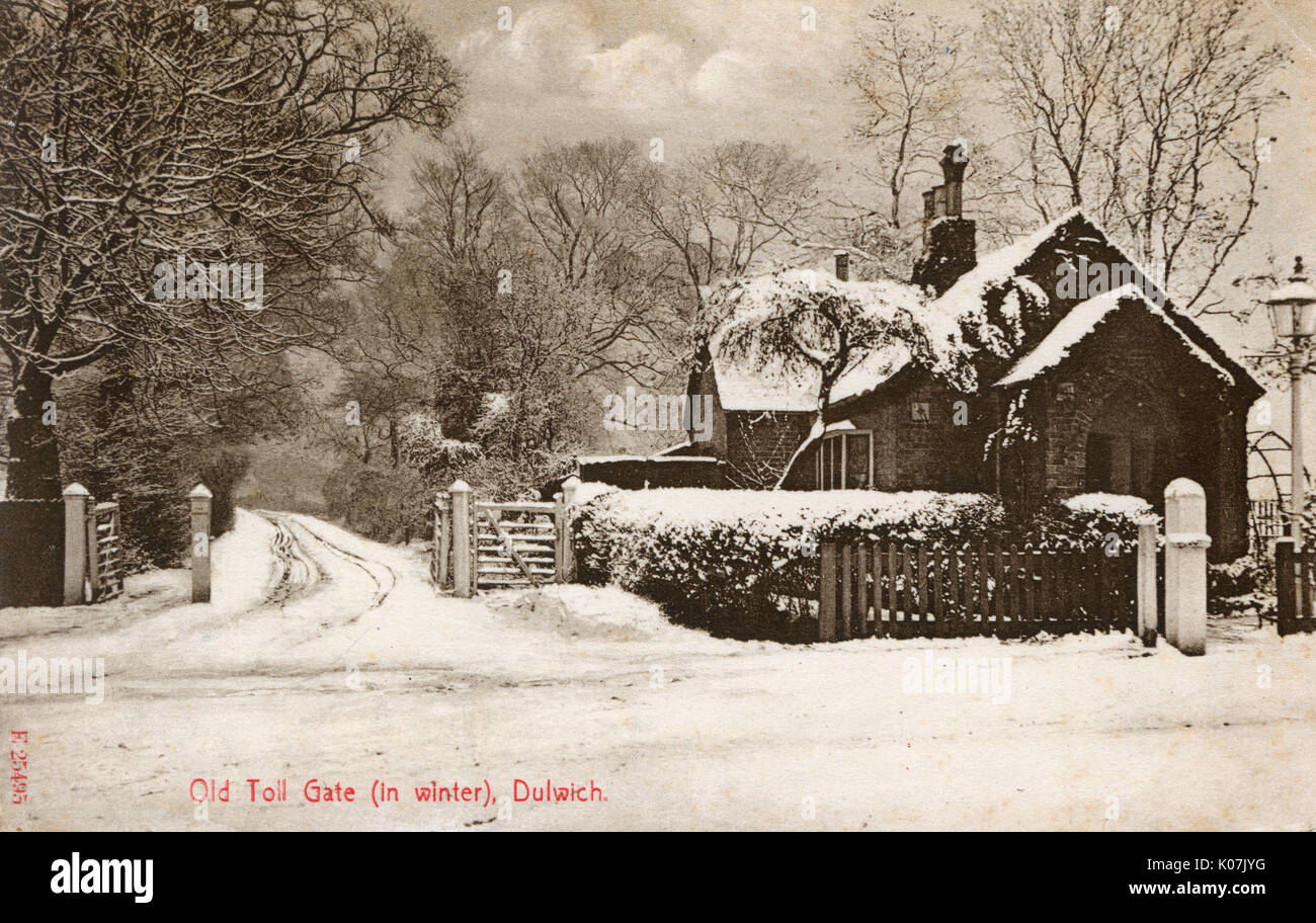 The Old Toll Gate in Winter - Dulwich, London. London's last Toll Gate. Set in sylvan surroundings, at College Road, Dulwich, south London, it is on property belonging to Dulwich College and is still in operation today (2017).     Date: 1906 Stock Photo