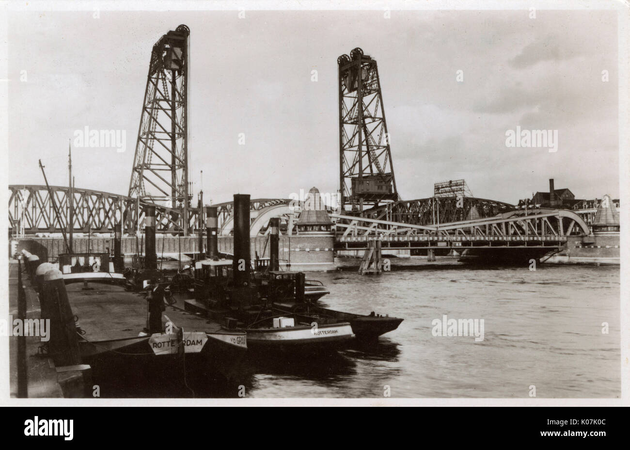 The Bridges (including the lift bridge) spanning a side branch of the River Mause (the Koningshaven), Rotterdam, The Netherlands. Photograph taken on Leliestraat.     Date: circa 1930s Stock Photo