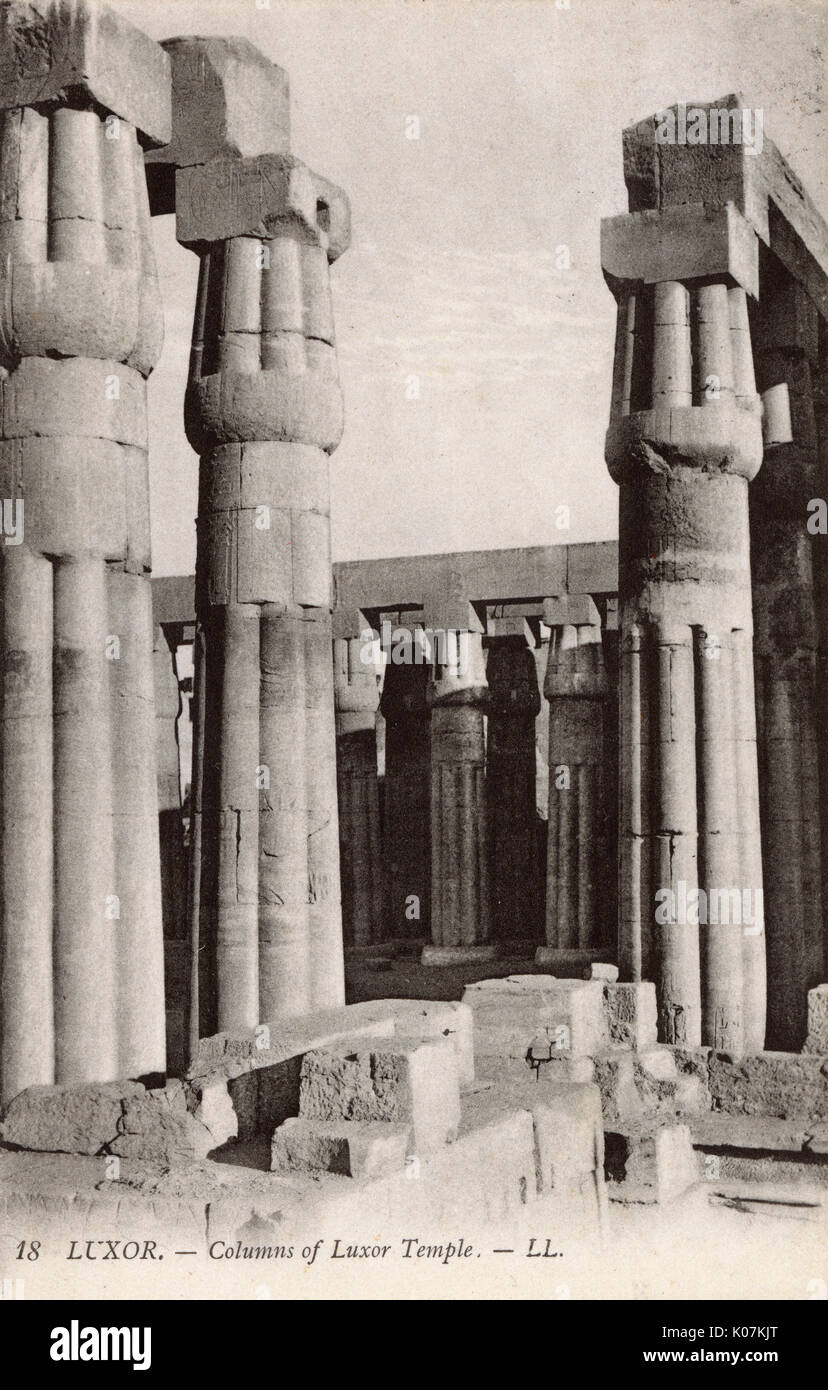 Columns of the Luxor Temple - a large Ancient Egyptian temple complex located on the east bank of the Nile River in Luxor (ancient Thebes).     Date: 1911 Stock Photo