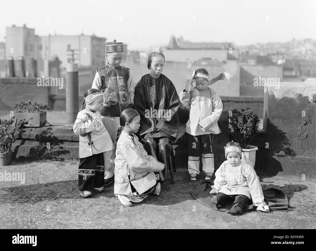 Chinese Woman And Children In Traditional Clothing In America Michigan