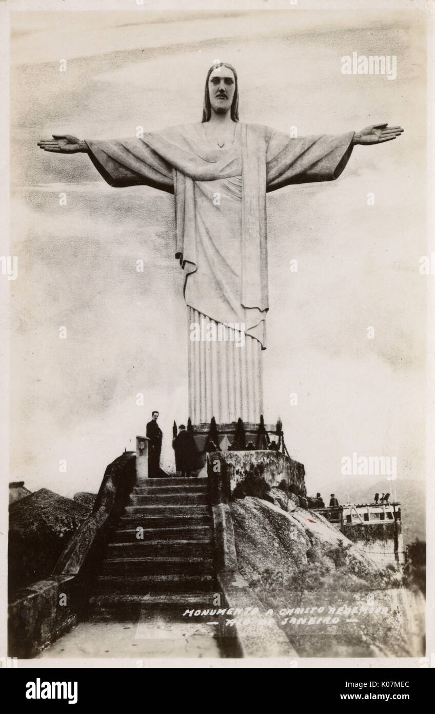 Brazil - Rio de Janeiro - The Statue of Christ the Redeemer at the summit of Mount Corcovado. Created by French sculptor Paul Landowski and built by the engineer Heitor da Silva Costa Brazil in collaboration with the French engineer Albert Caquot. Romanian sculptor Gheorghe Leonida created the face of the statue. Completed on October 12th, 1931.     Date: circa 1930s Stock Photo