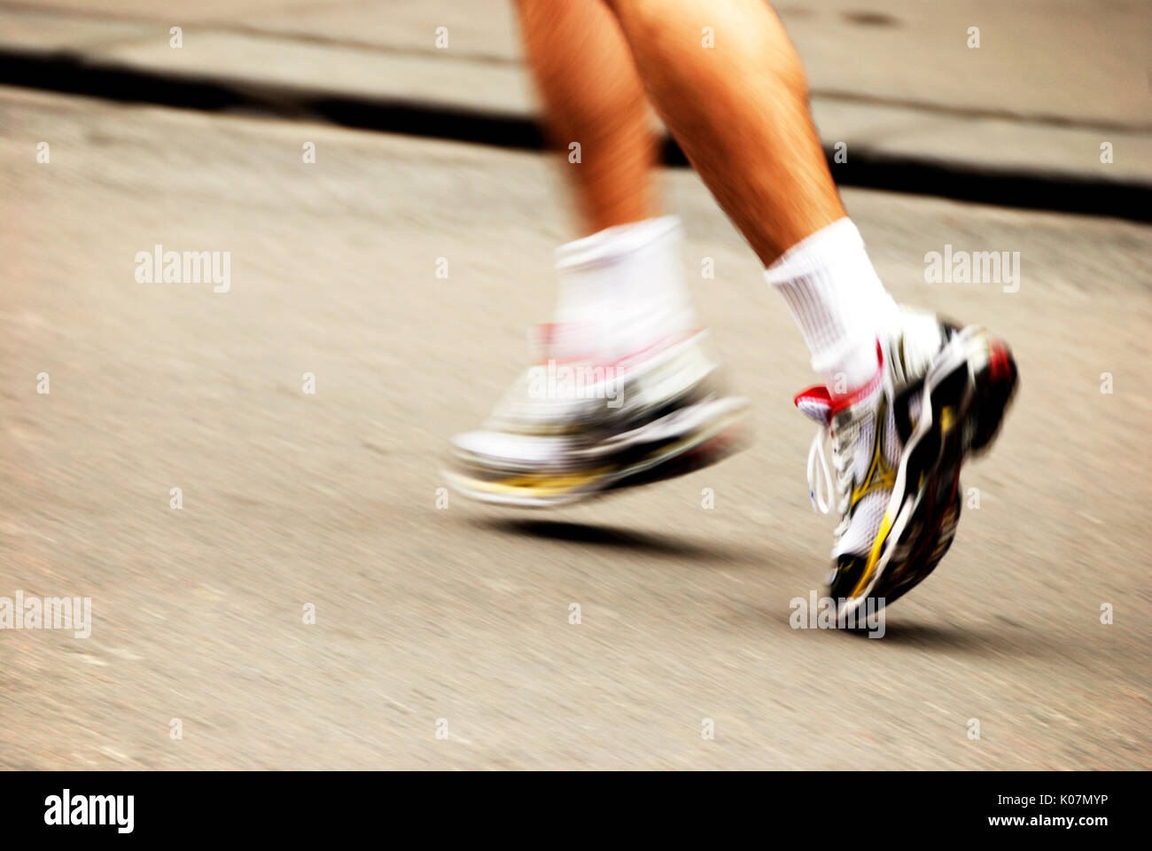 athlete running legs Stock Photo