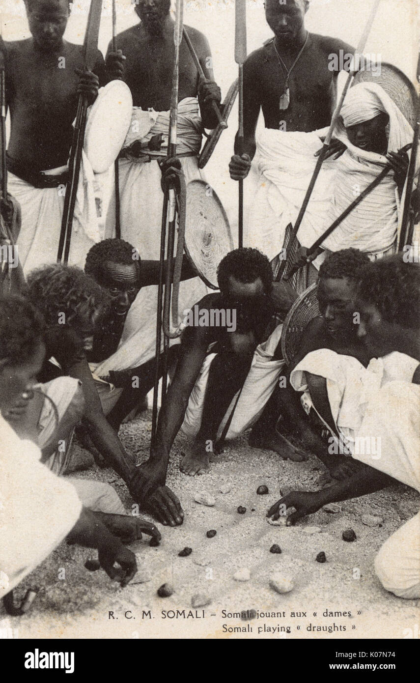 Somalian - Somali warriors playing draughts Stock Photo