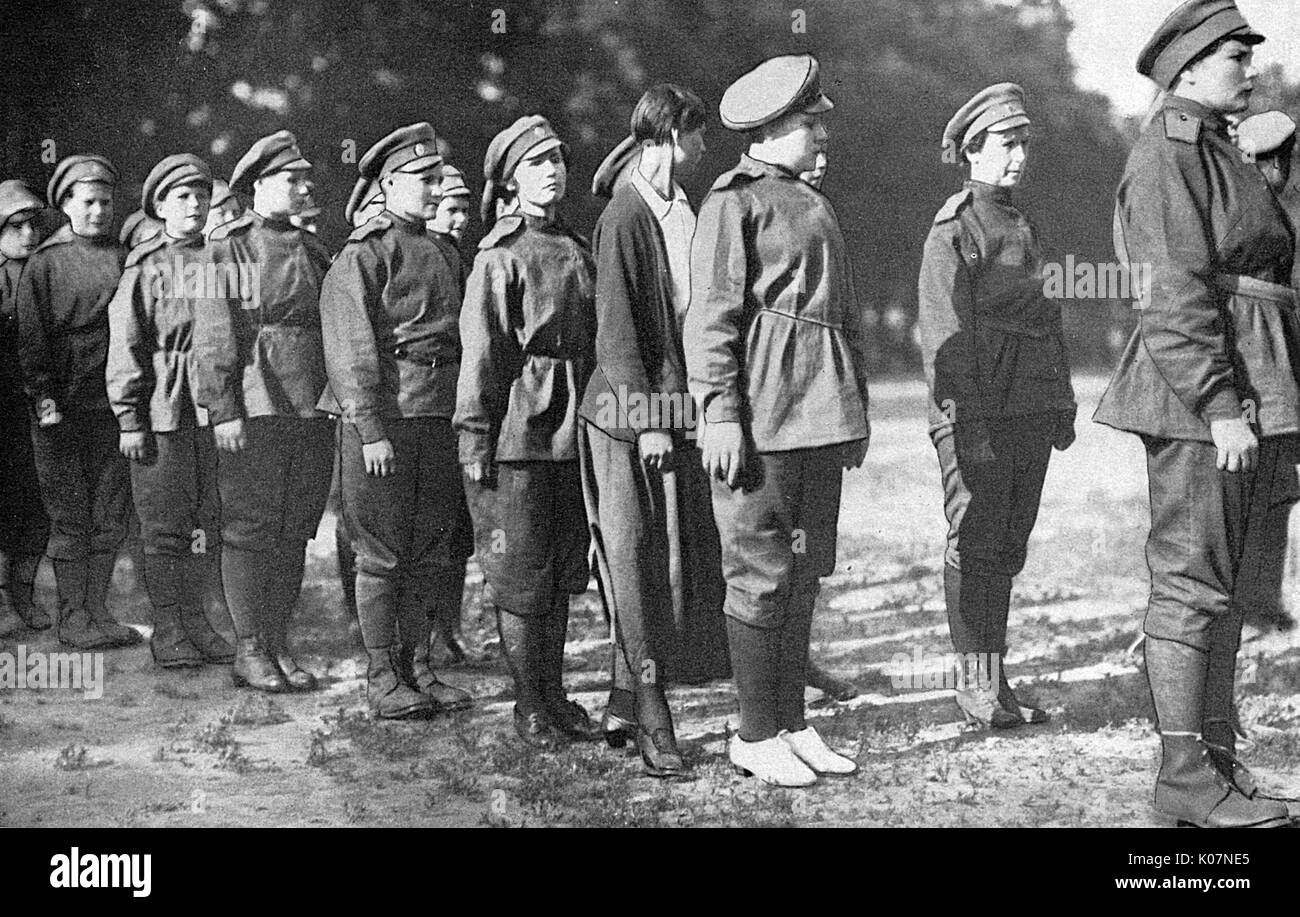 Women who have enlisted in the Women's Battalion of Death, Russia, to fight alongside the men during the First World War. Seen here in uniform, apart from one woman who is still in civilian clothes.       Date: circa 1917 Stock Photo