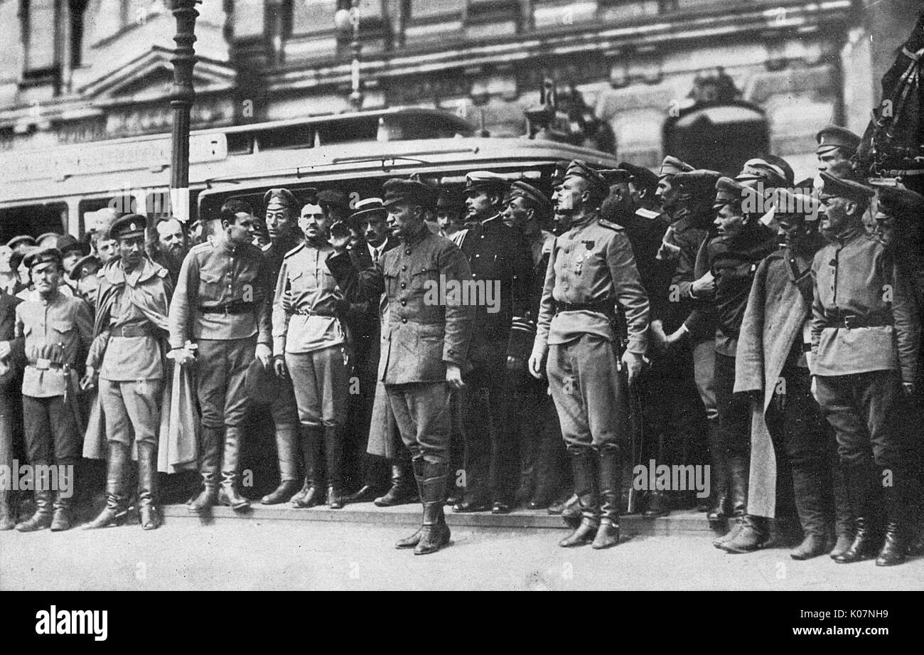 Kerensky reviewing Cossack soldiers in a Russian street Stock Photo
