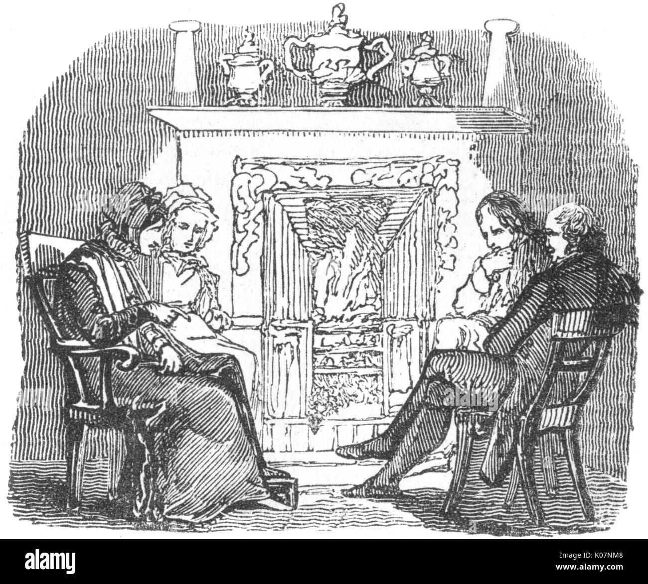 Group in front of fire, c. 1800 Stock Photo