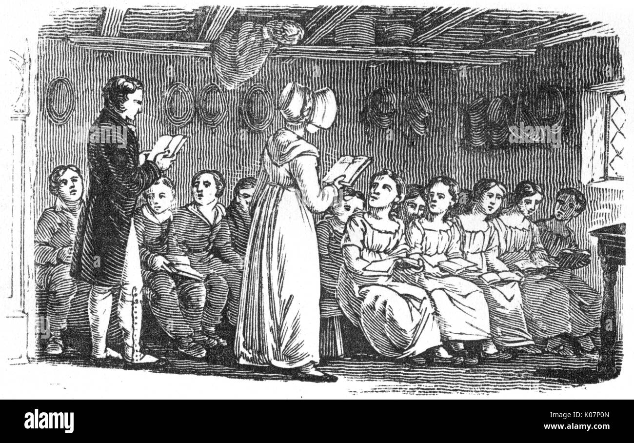 School room, male and female teachers reading aloud to pupils, c.1800     Date: C.1800 Stock Photo