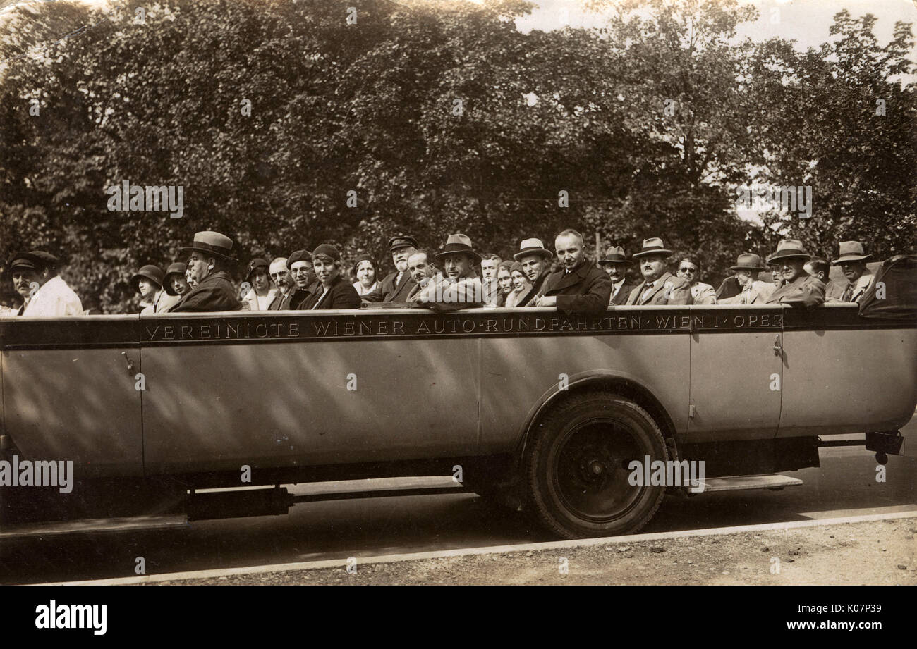 People in a large charabanc, taking a round trip of Vienna, Austria.      Date: 1931 Stock Photo