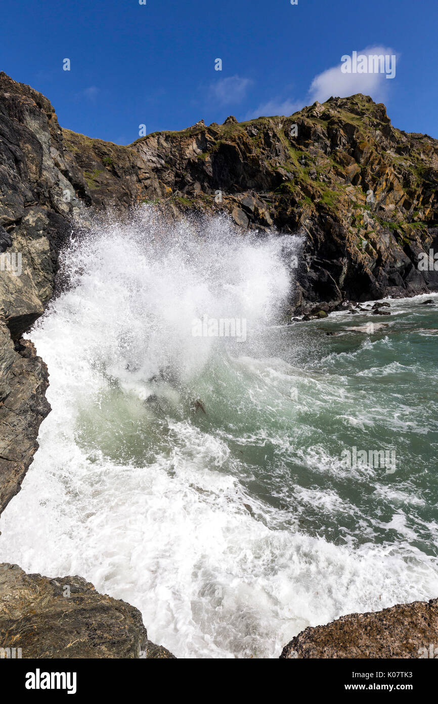 Waves, spray, Mullion Cove, Lizard Peninsula, Cornwall, England, United Kingdom Stock Photo