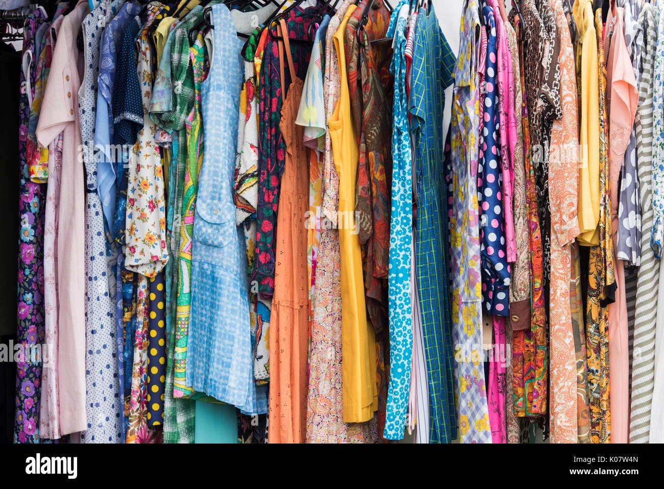 Vintage Style Dresses on a clothes rail at a vintage retro festival. UK Stock Photo Alamy