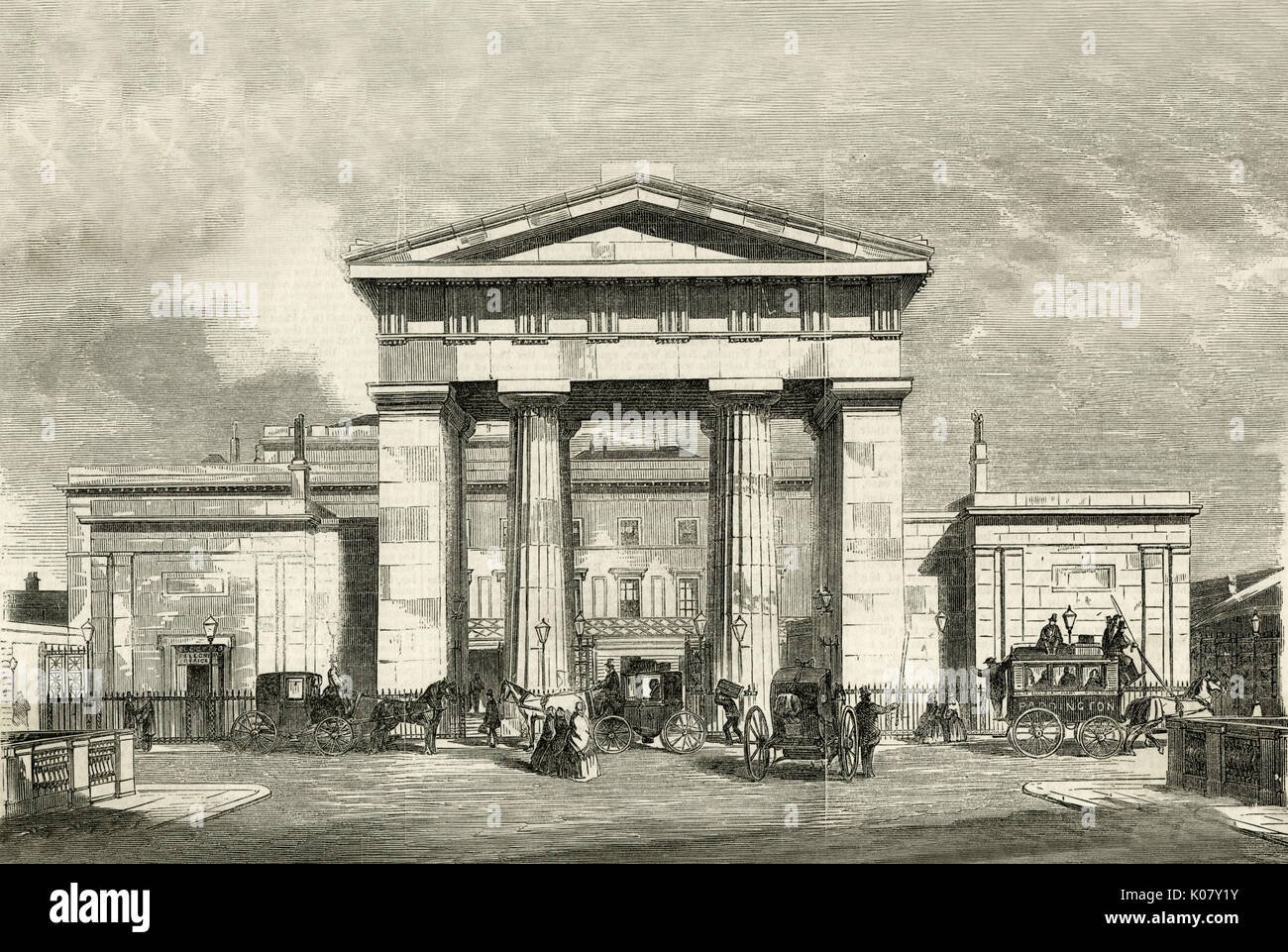 Euston- Station, London serving the London and North-Western Railway. The Euston Arch, built in 1837, was the original entrance to the station, facing onto Drummond Street. It was demolished in 1961.      Date: 1858 Stock Photo