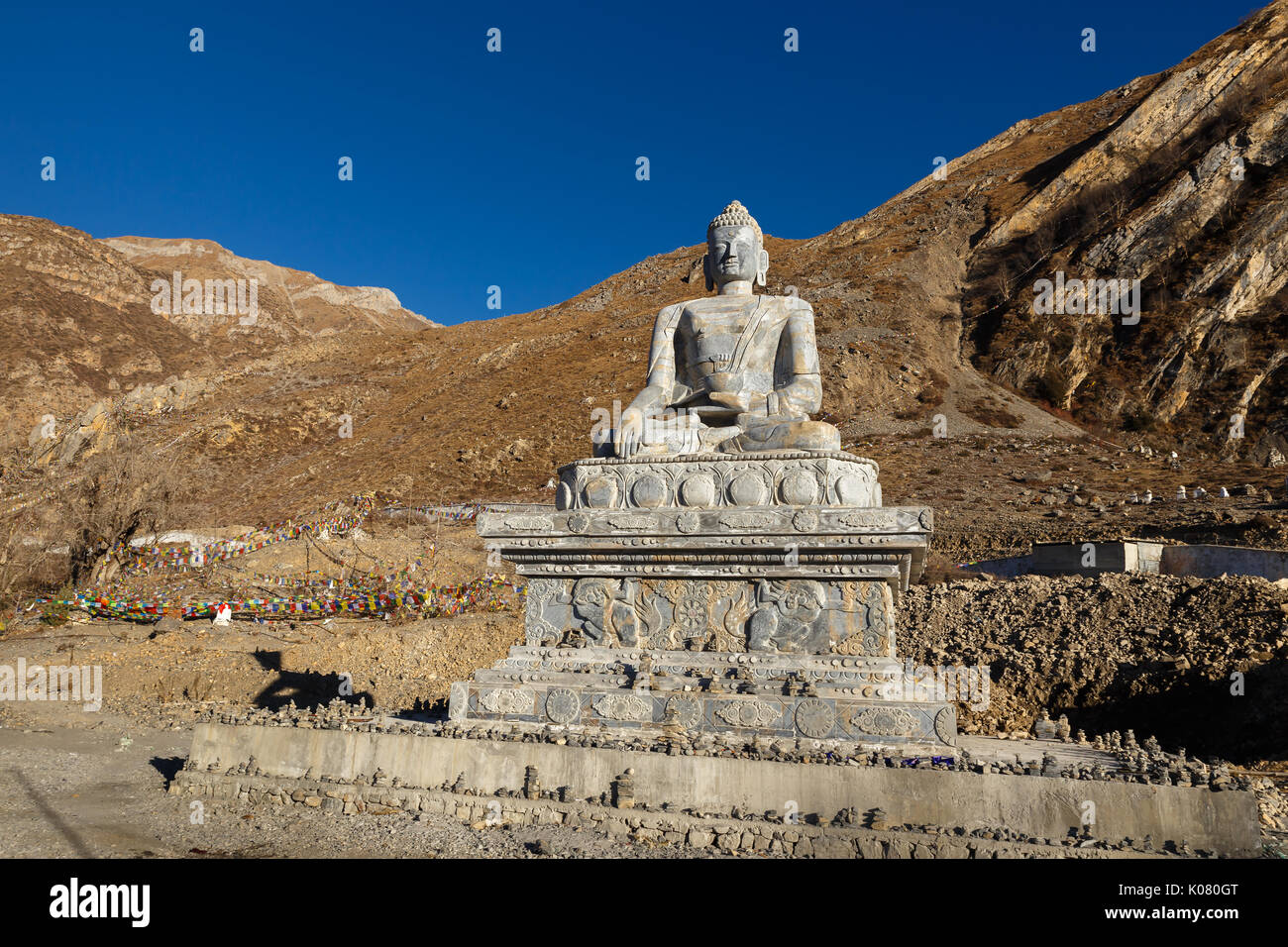 Shakyamuni Buddha stone statue in Muktinath temple, Nepal Stock Photo