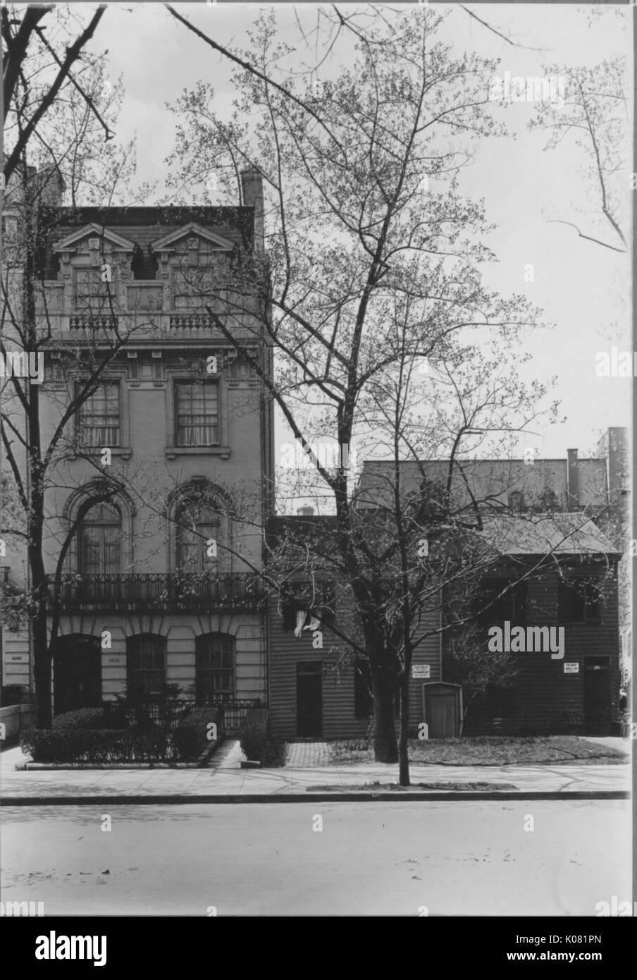 Photograph of a street in Baltimore of Roland Park apartments, the