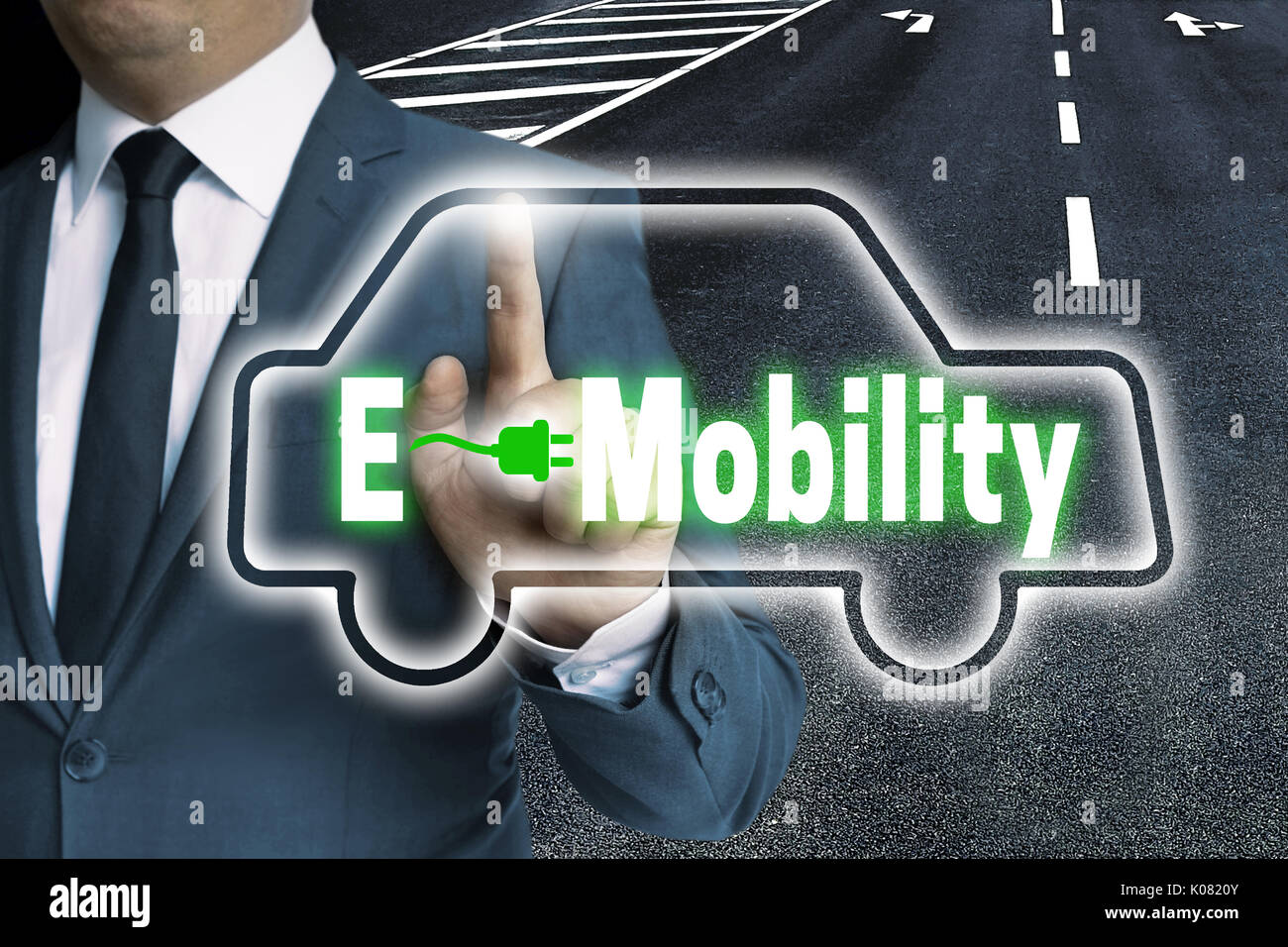 E-Mobility touchscreen is operated by man concept. Stock Photo