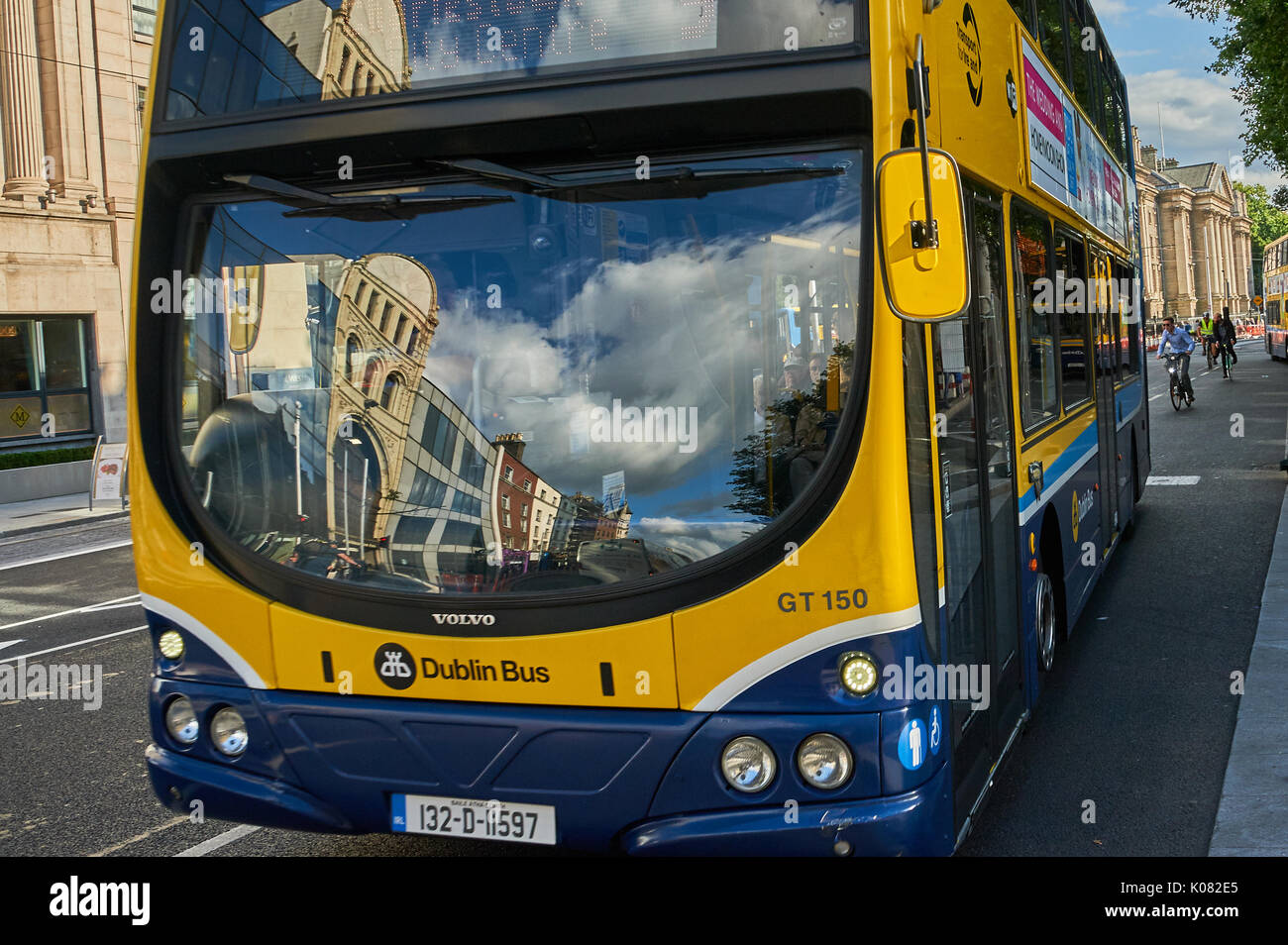 Blue and yellow double decker bus in Dublin city centre Stock Photo - Alamy