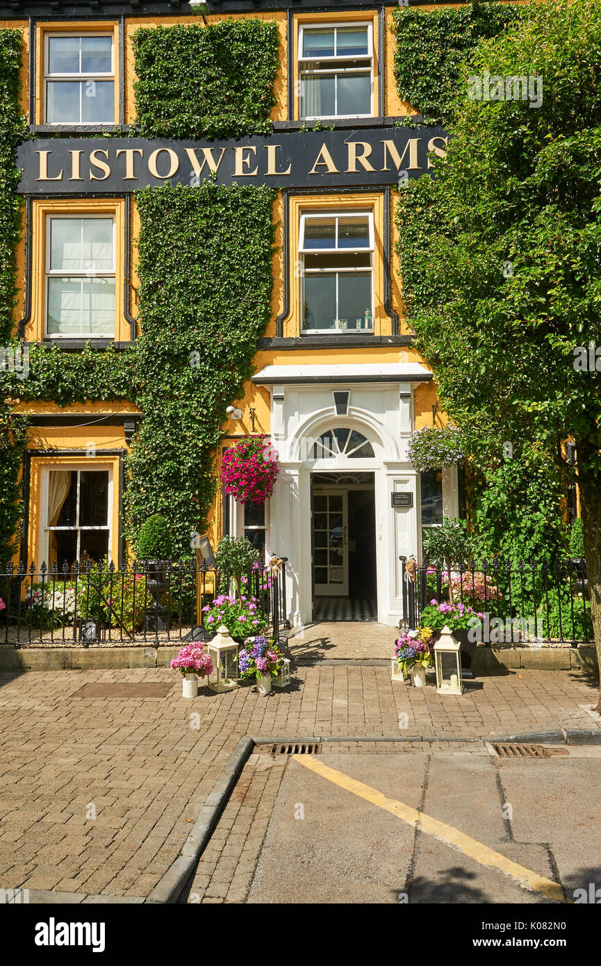 Ivy covered building façade of the Listowel Arms Hotel in the centre of