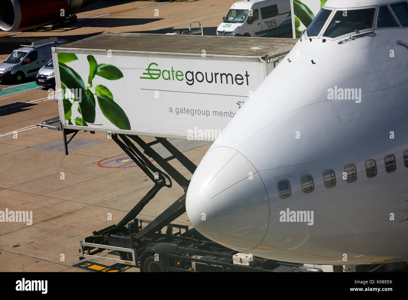 Gate Gourmet loading food onto a Virgin 474 at  Gatwick Airport's North Terminal Stock Photo
