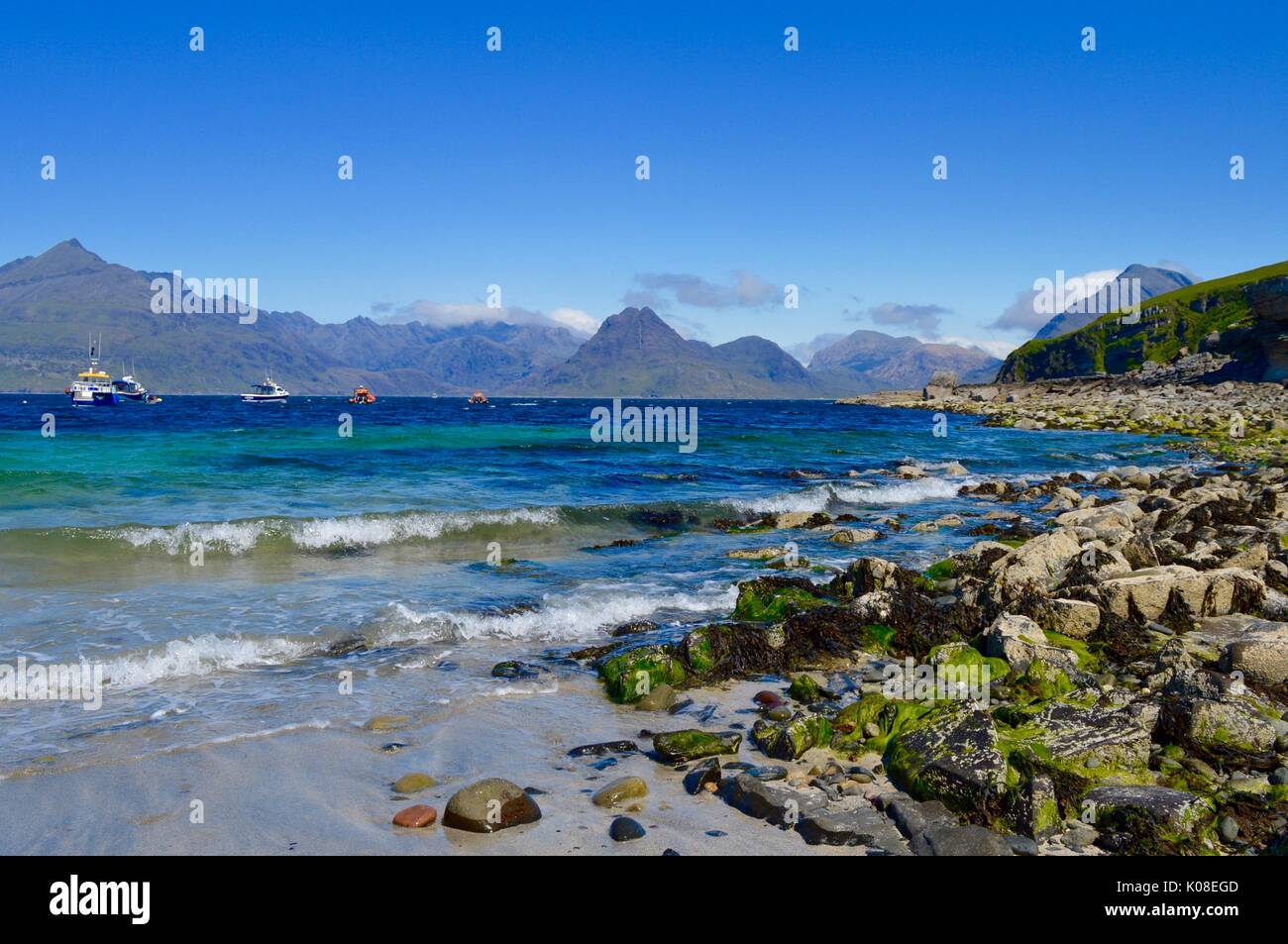 The beach at Elgol looking across Loch Scavaig towards the Cuillin Mountain range. Stock Photo