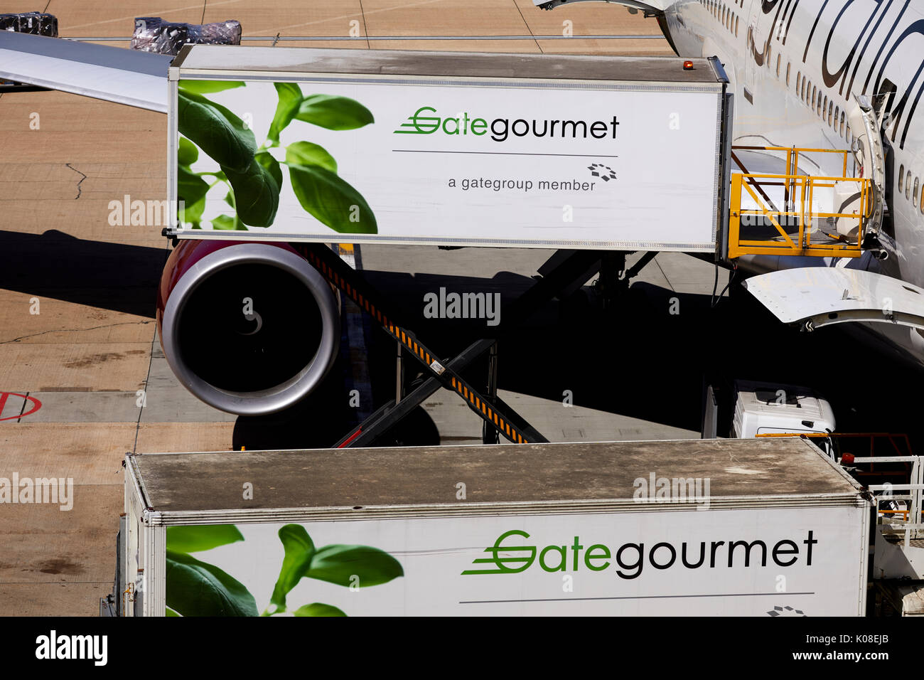 Gate Gourmet loading food onto a Virgin 474 at  Gatwick Airport's North Terminal Stock Photo