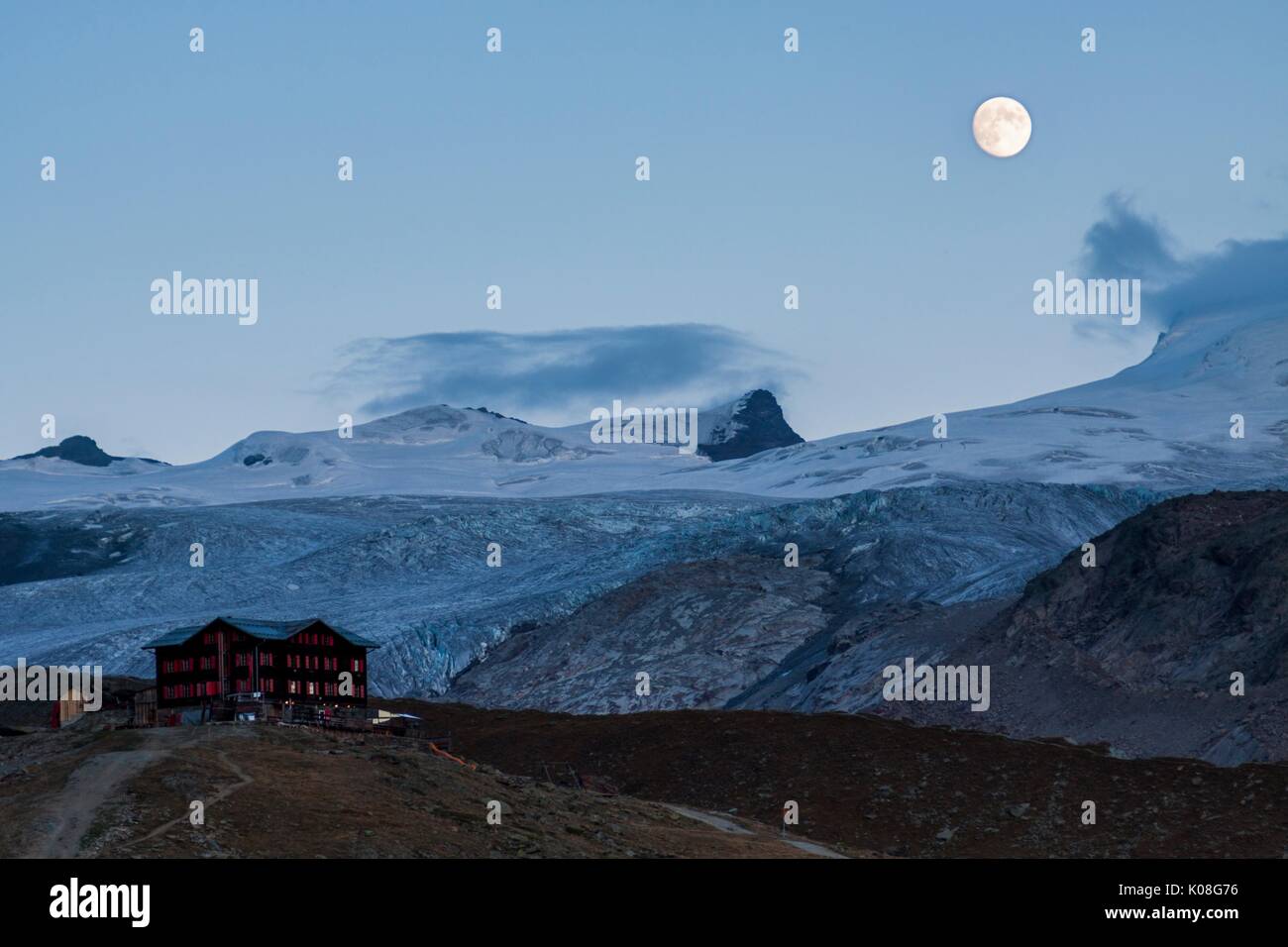Full moon night at the shelter Fluhalp,Zermatt valley, Valais-Wallis Canton, Switzerland Stock Photo