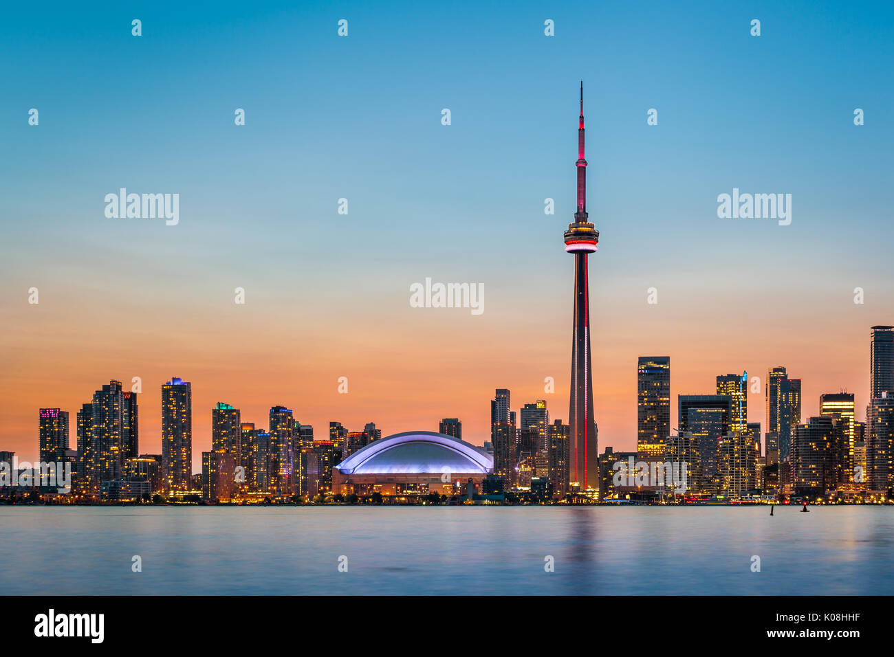 Skyline of Toronto over Ontario Lake at twilight Stock Photo - Alamy