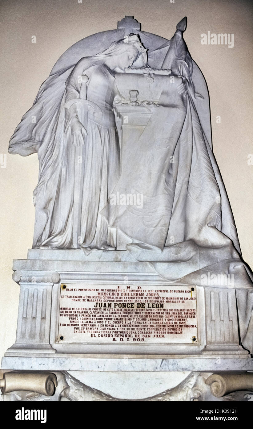 The marble tomb of famed Spanish conquistador Juan Ponce de Leon is in the Cathedral of San Juan Bautista in historic Old San Juan in Puerto Rico (PR), an unincorporated territory of the United States in the Caribbean Sea. The explorer died in Cuba in 1521 from wounds received while fighting Indians during his second voyage to Florida, but his body was transferred to Puerto Rico, which he had conquered for Spain in 1508. His remains were originally entombed in the Church of San Jose until being moved to the cathedral in 1908. Puerto Rico's third largest city, Ponce, is named for the adventurer Stock Photo