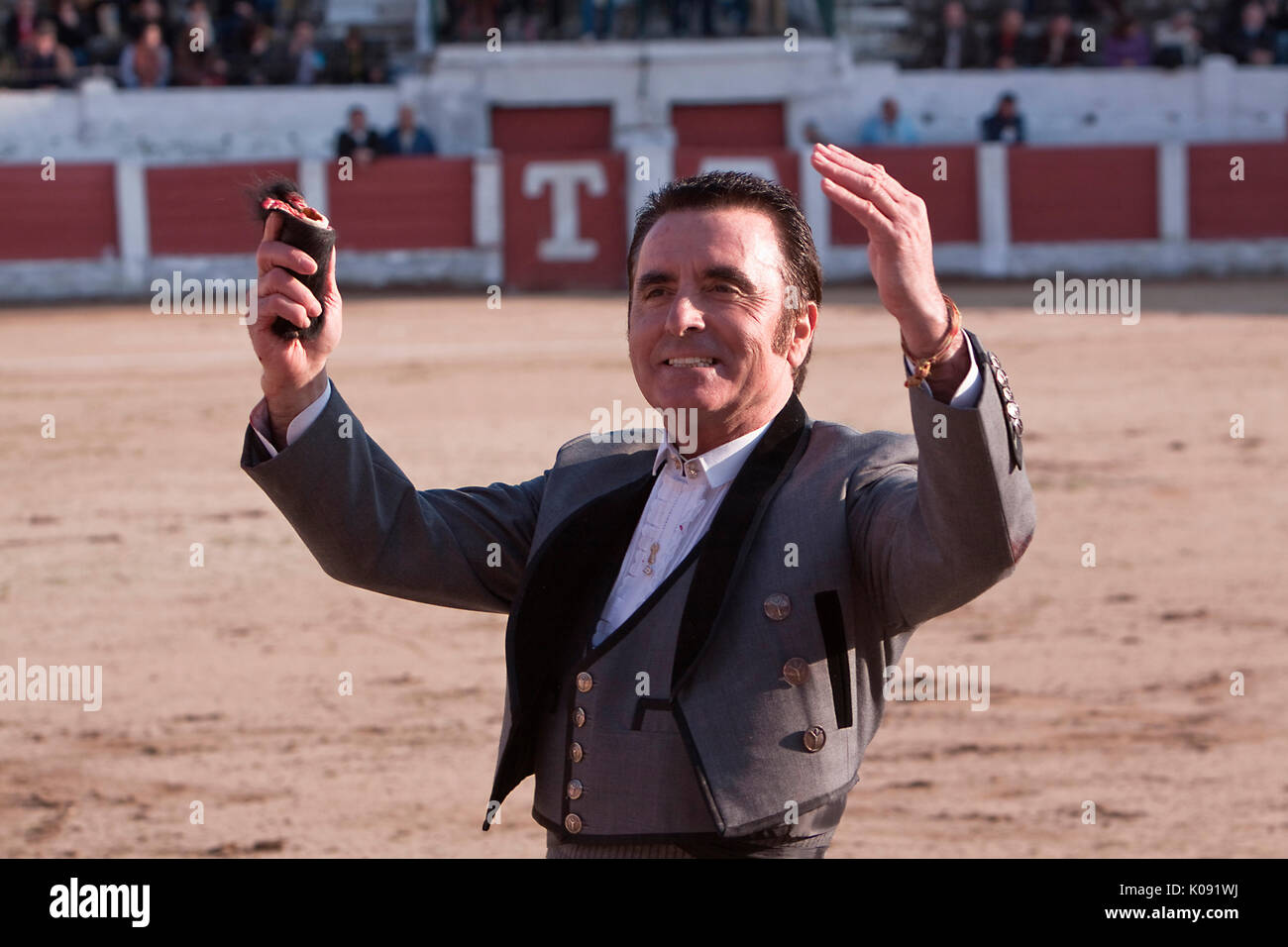 The Spanish Bullfighter Jose Ortega Cano to the turning of honour with an ear in his hand, Linares, province of Jaen, Spain, 14 march 2010 Stock Photo