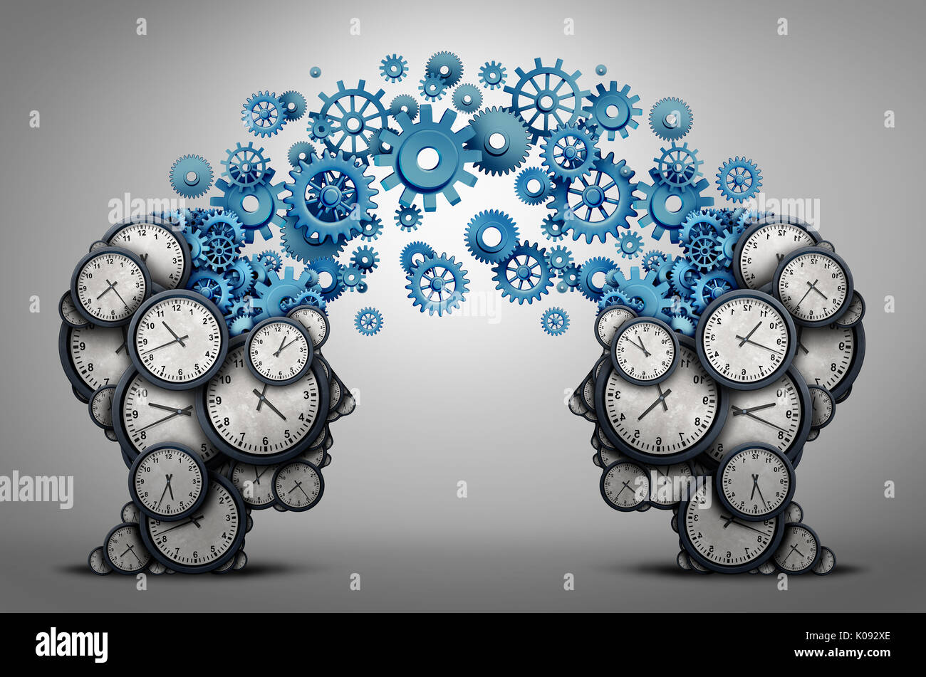 Business time planning partnership as two people heads made of clock cog and gear objects linked together as an organizing a meeting. Stock Photo