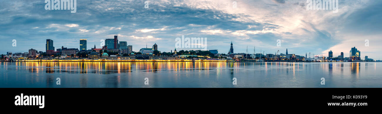Panorama of the Hamburg Skyline in Germany at sunrise during the blue hour. Stock Photo