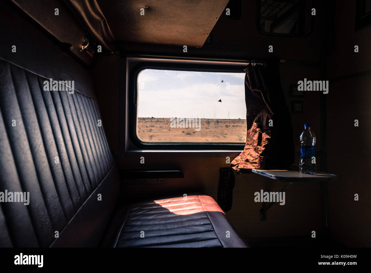 Wide Angle Picture Of First Class Train Cabin With Leather Seat