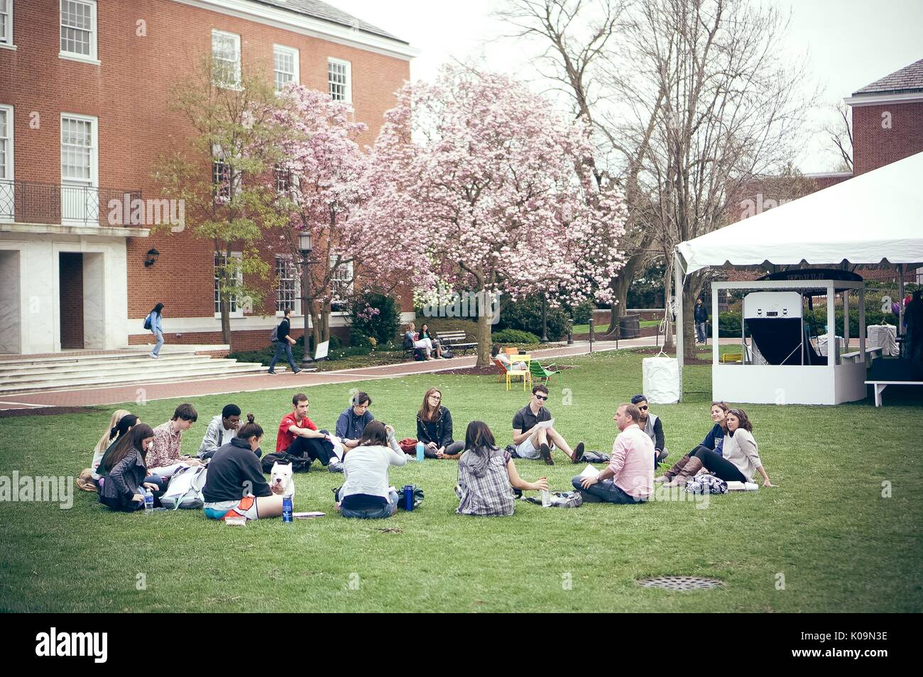 College students sitting in a circle on Johns Hopkins University's Wyman Quad, a social gathering area for college students in front of Shriver Hall, 2015. Courtesy Eric Chen. Stock Photo