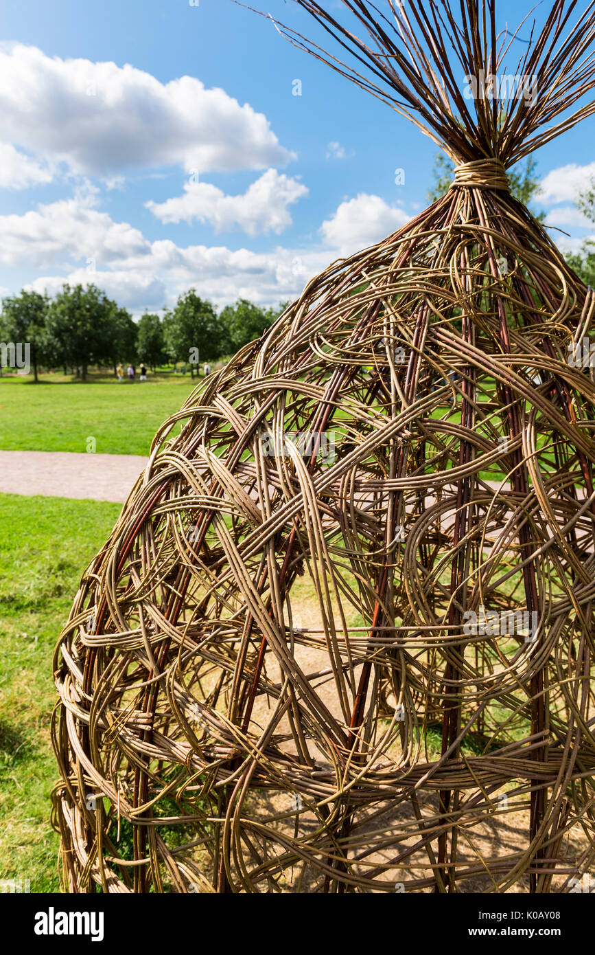 Wigwam structure made from woven willow. Stock Photo