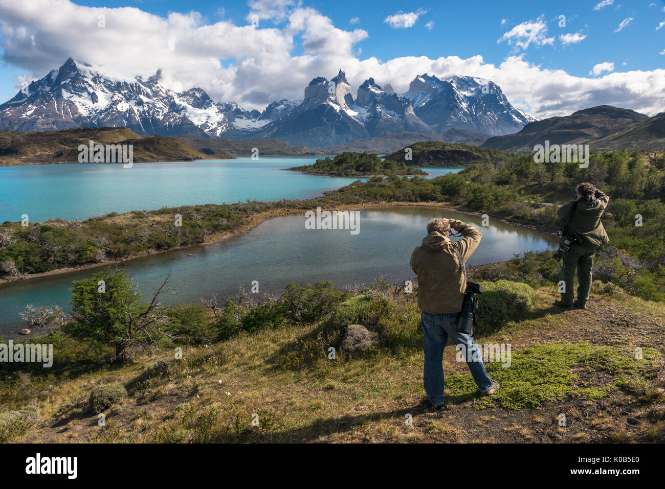 Photographers shooting the landscape of Torres del Paine Stock Photo