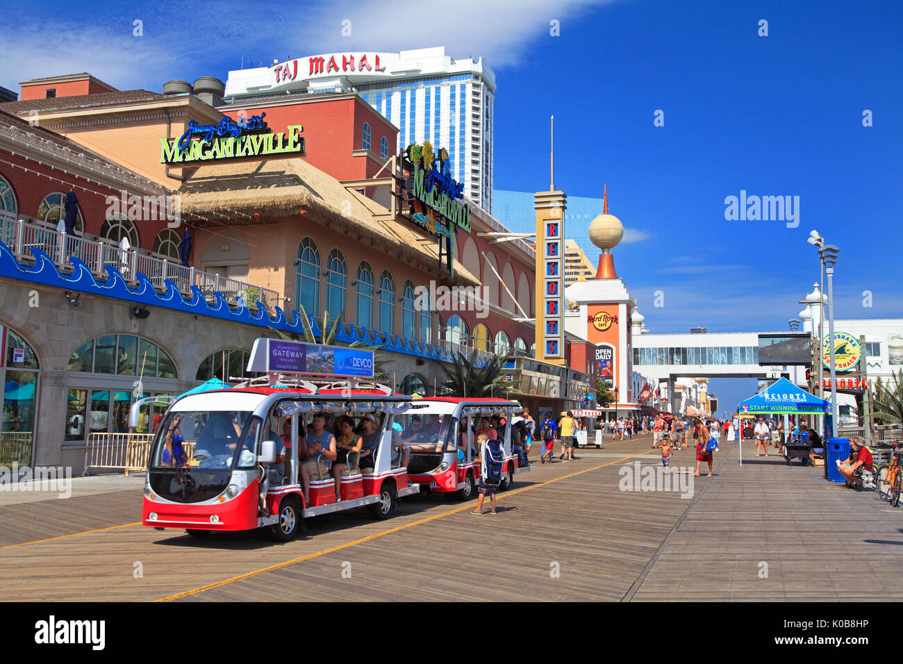 ATLANTIC CITY, NEW JERSEY - AUGUST 19, 2017: Tourists traveling on the boardwalk in Atlantic City. Established in the 1800s as a health resort, today Stock Photo